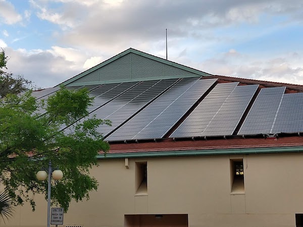 A building in Gainesville, Florida, with rooftop PV panels